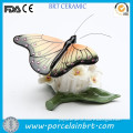 Hand butterfly standing a flower shape Ceramic Figurine